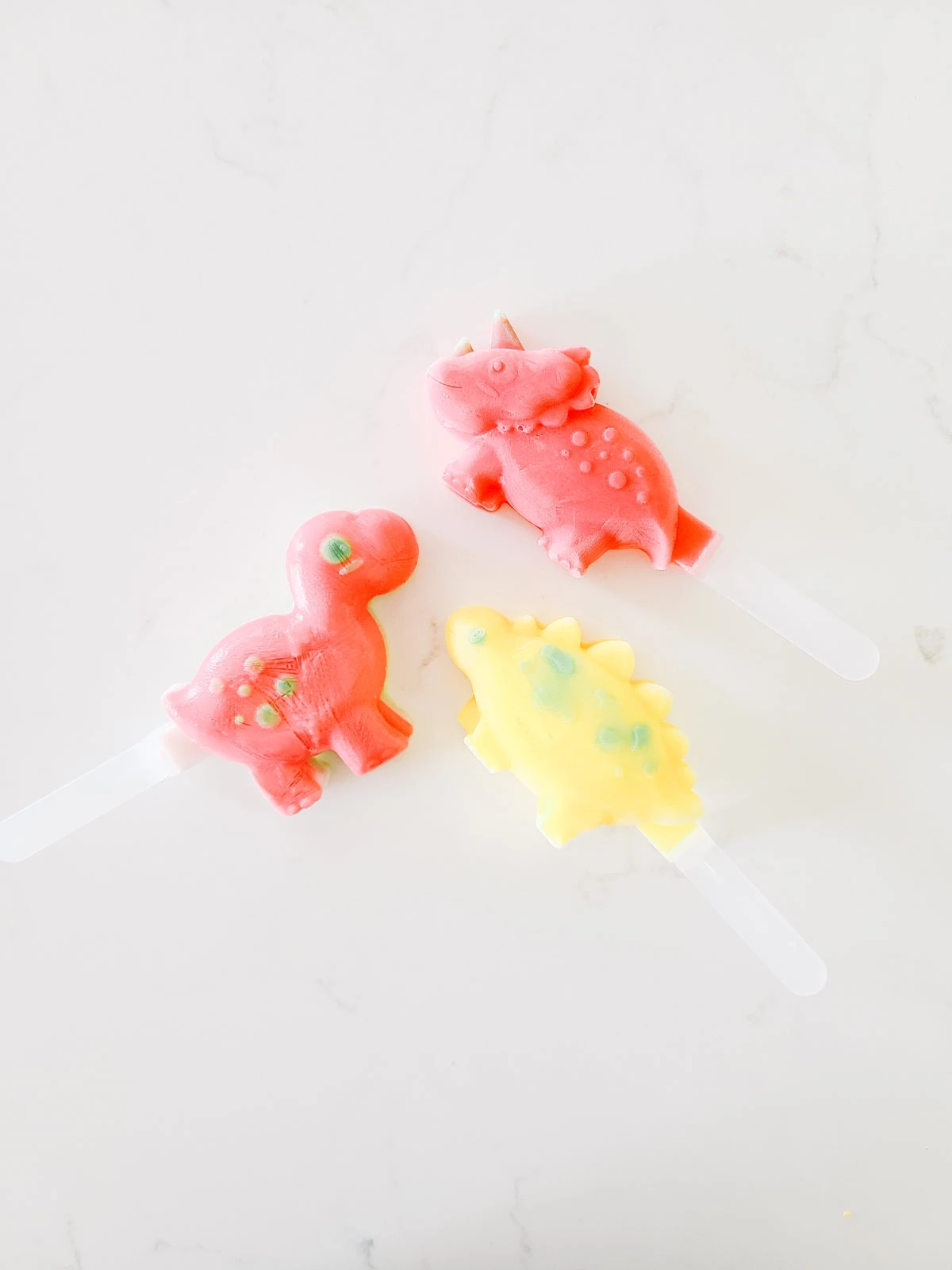 popsicle molds made from silicone in dinosaur dino icecream mold