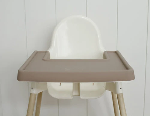 Ikea highchair diy hack with accessories.  Cushion cover, placemat, footrest and leg wraps taupe neutral color