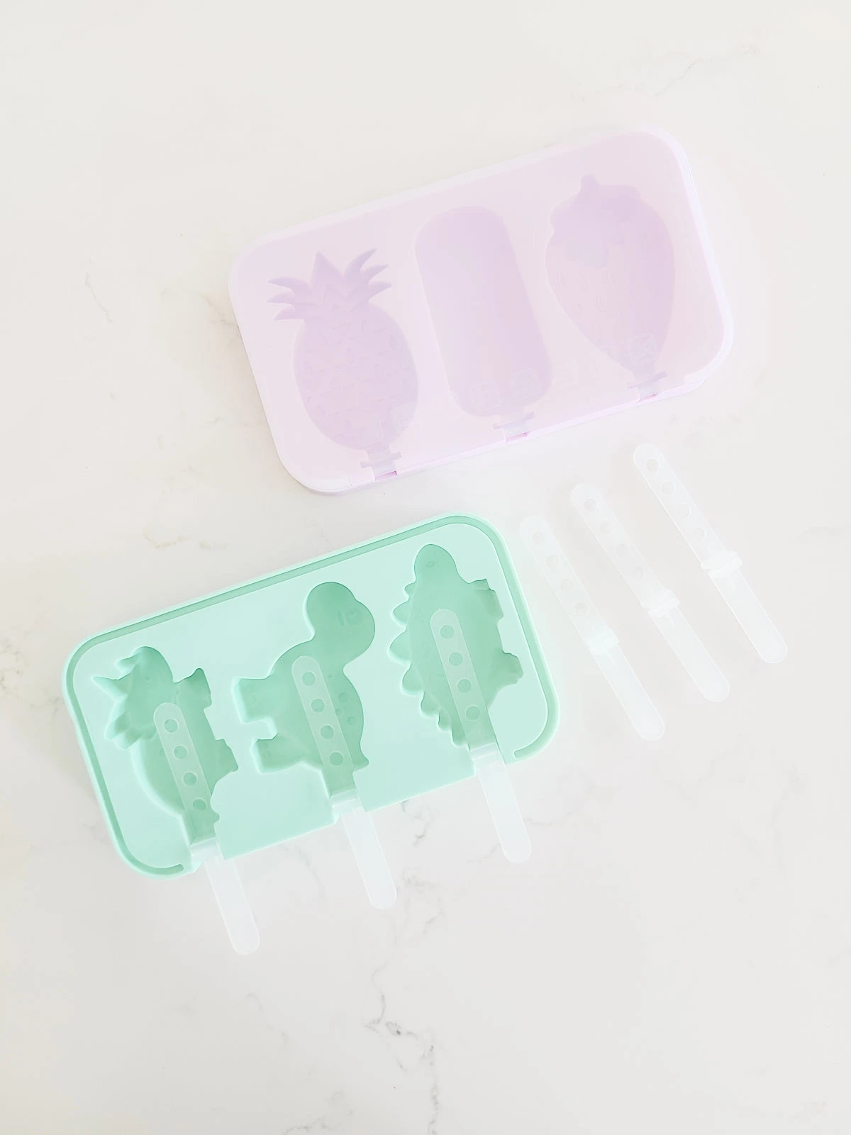 popsicle molds made from silicone in dinosaur and fruit shape use in freezer or oven